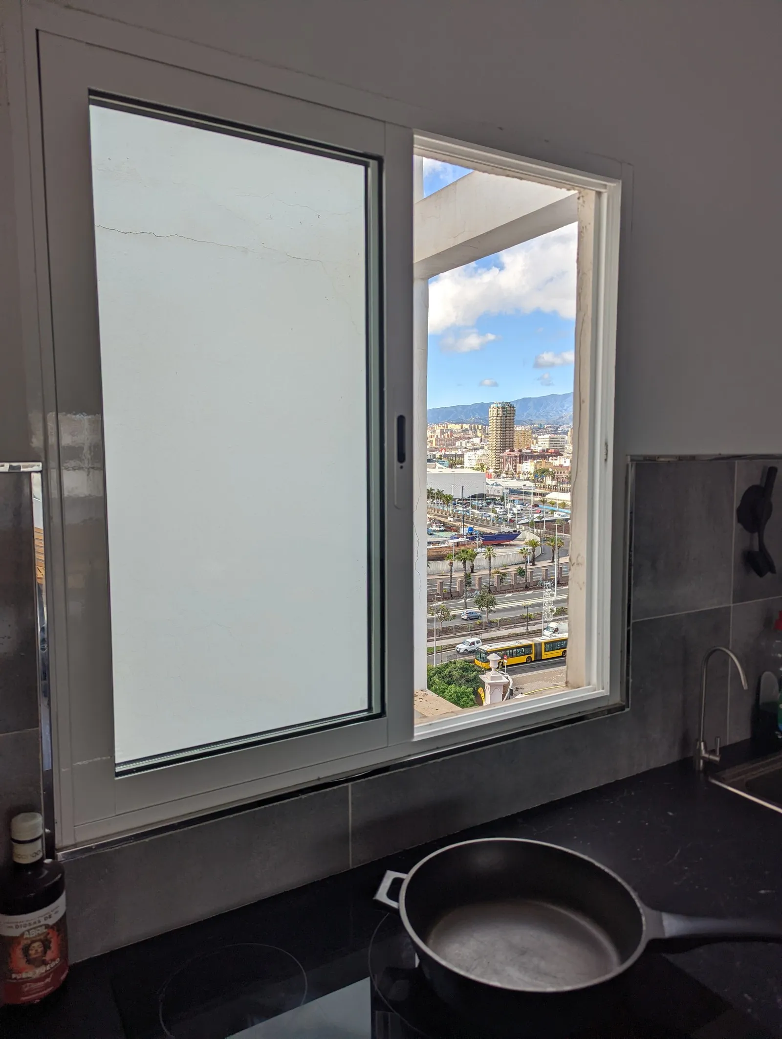 Kitchen and living room at J48 Penthouse - view from the kitchen