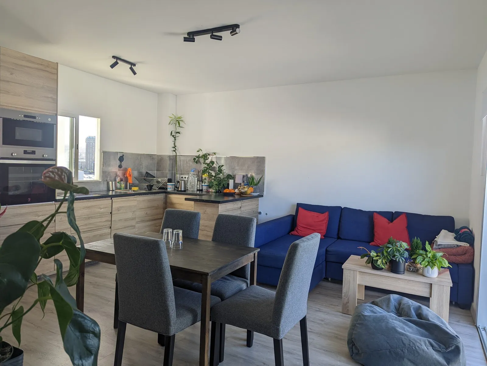 Kitchen and living room at J48 Penthouse