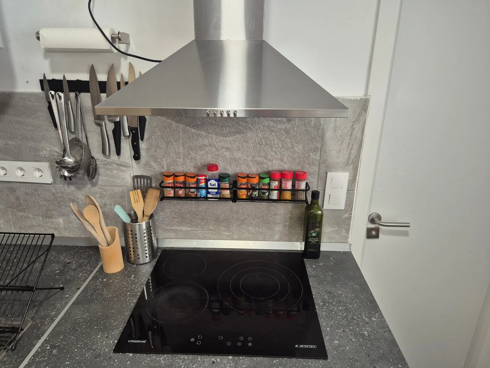 Kitchen at P21 Outpost - stove, spice rack, knife block, paper towel holder
