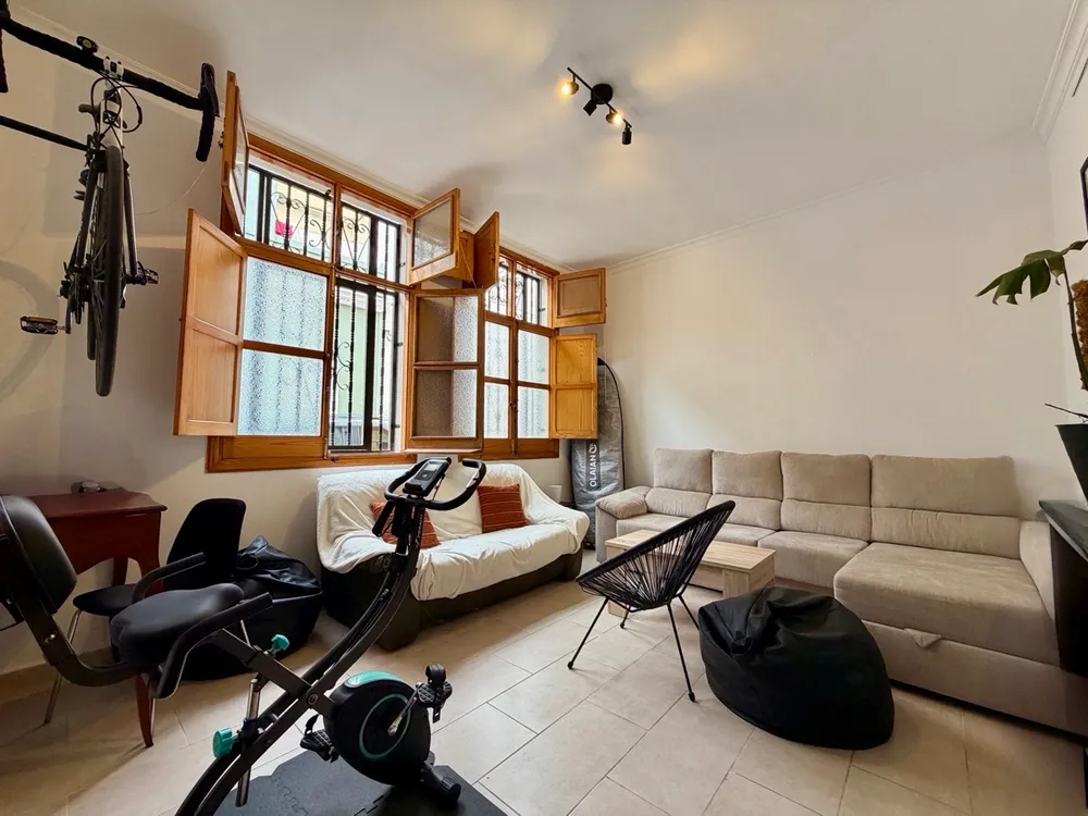 Living room at U32 Headquarter - racing bike, stationary bike, sofas, cozy