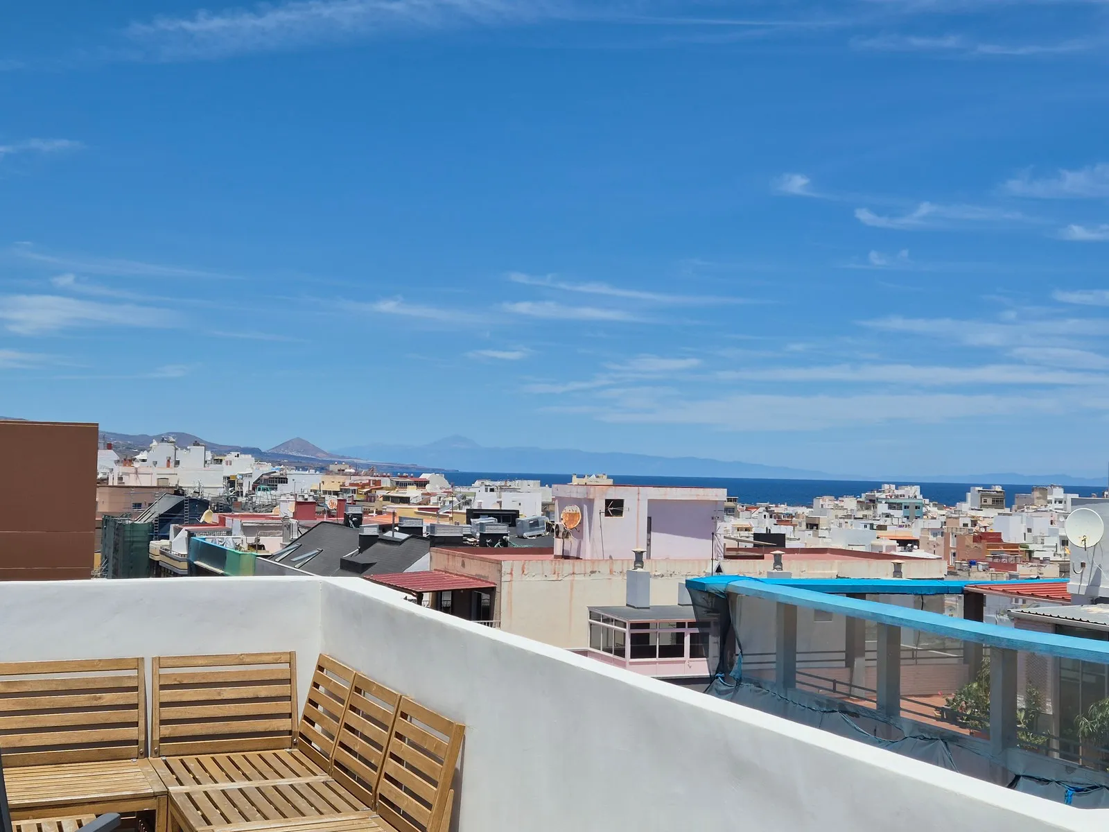 Northern terrace at J48 Penthouse - view, Teide, Tenerife on the horizon, blue sky