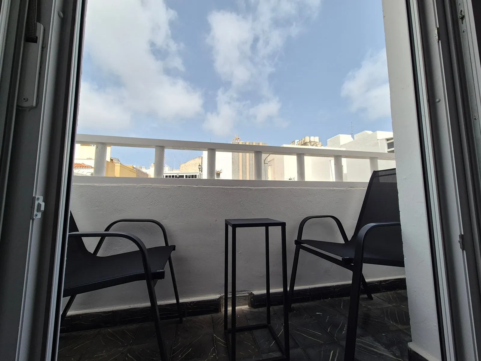 Private balcony at Triathlon Territory - seating outside