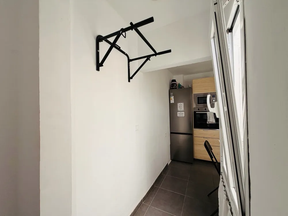Pull-up coffee hallway at P21 Outpost - pull-up bar