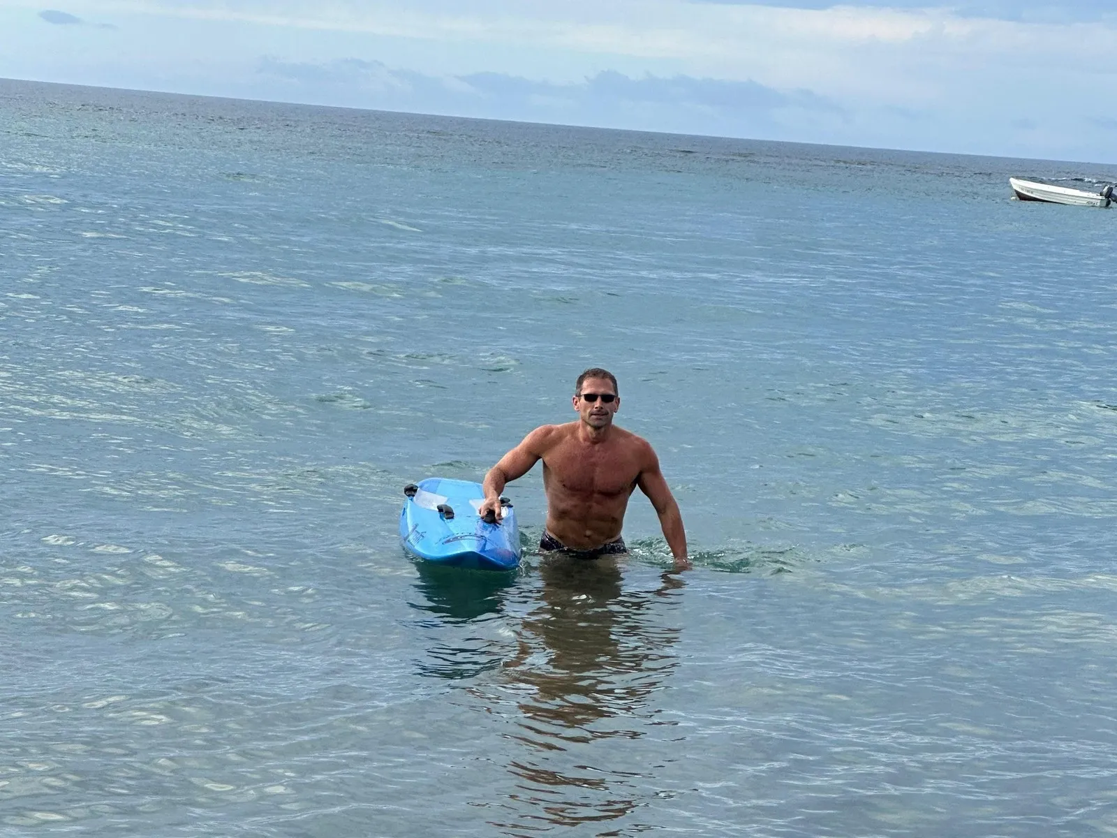 Rescueboarding - walking into the water, rescue board