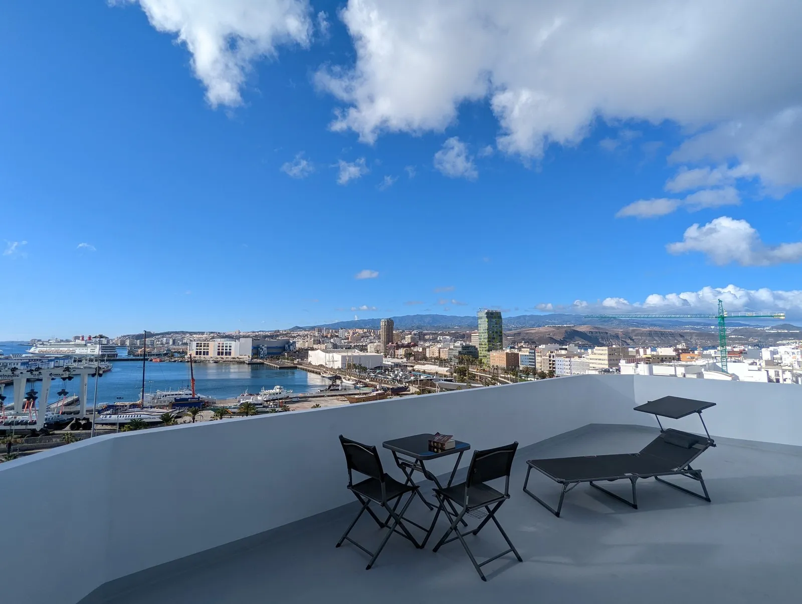 Southern terrace at J48 Penthouse - blue sky, sunbed, seating area, viewpoint
